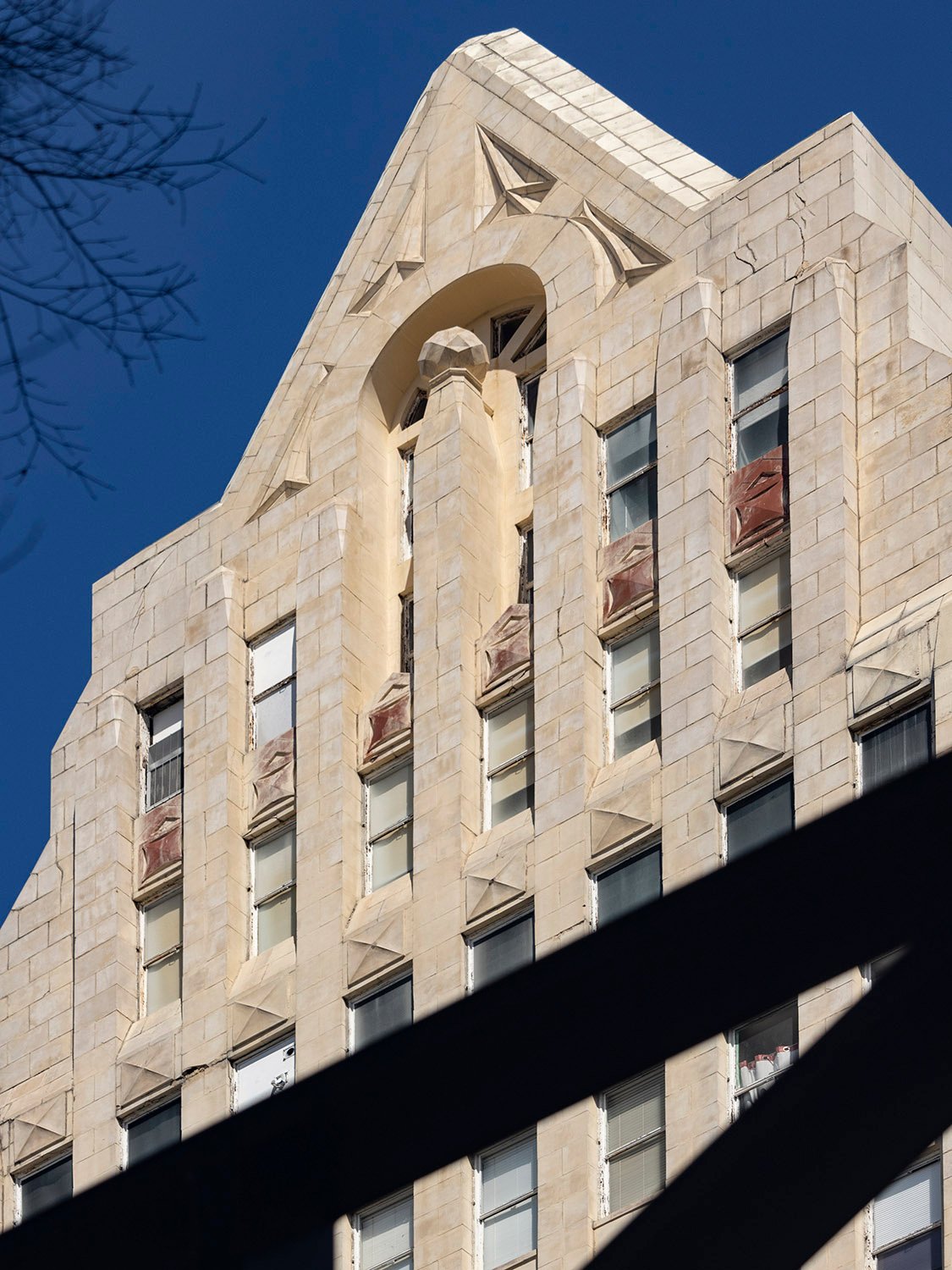 Looking up at the Watts Building from the southwest
