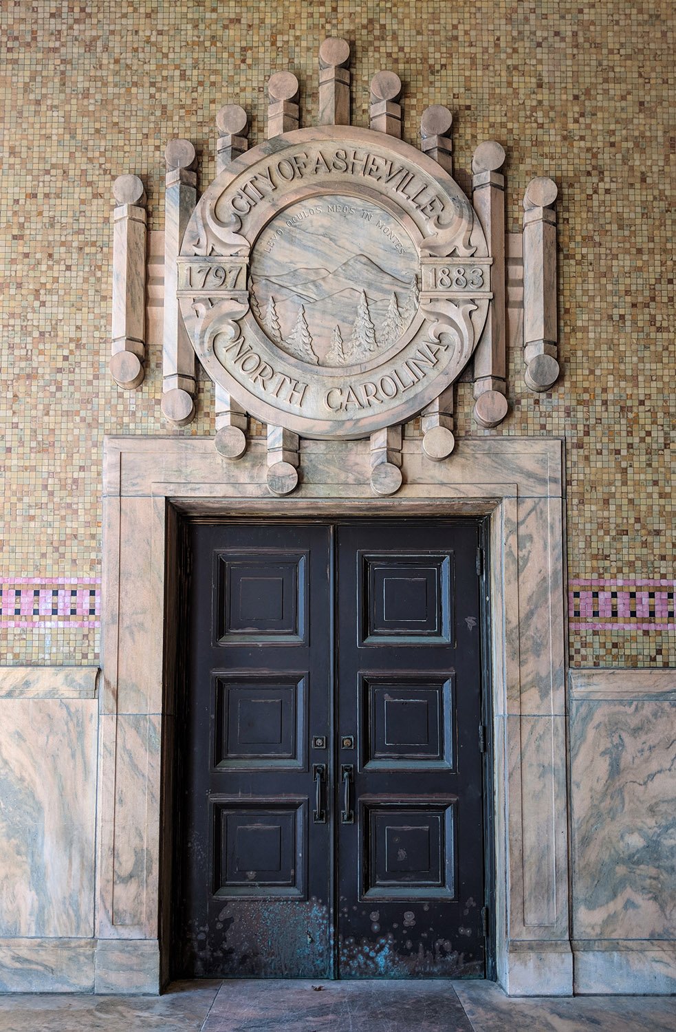 Entrance and marble bas-relief ornamentation on the City Building, Asheville, North Carolina