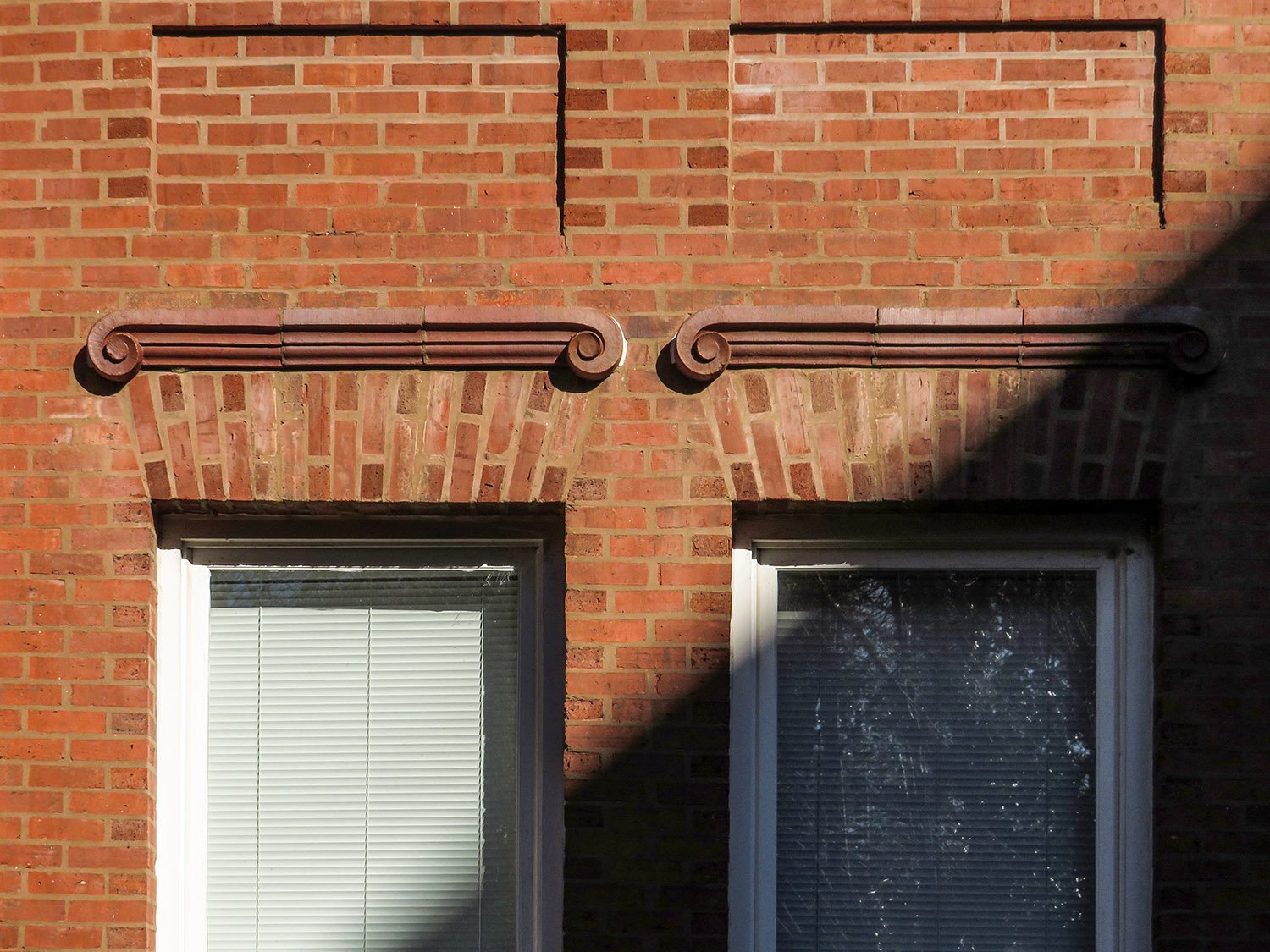 Spandrels, terracotta dripstones, and first-floor windows on the Lyman Hall Laboratory of Chemistry, Atlanta