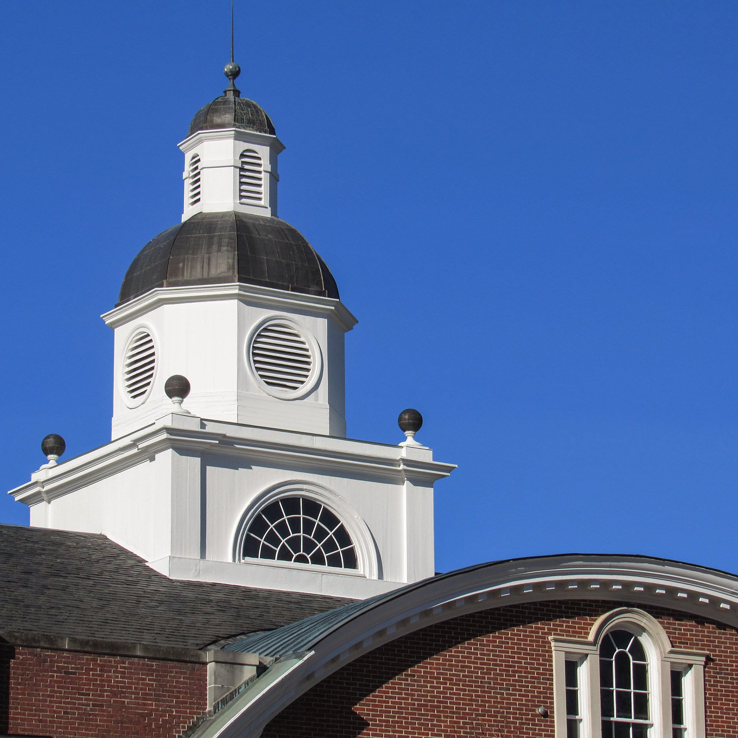 Cupola, curved gable, and Palladian window on the facade of North Fulton High School, Atlanta