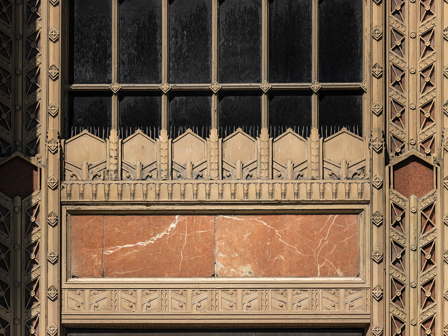 Bronze and marble transom panels at the entrance of Suburban Station, Philadelphia