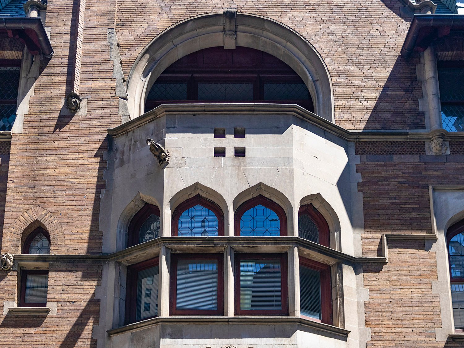 Second-floor bay window and third-floor balcony on the west elevation of the Clarence B. Moore Residence, Philadelphia