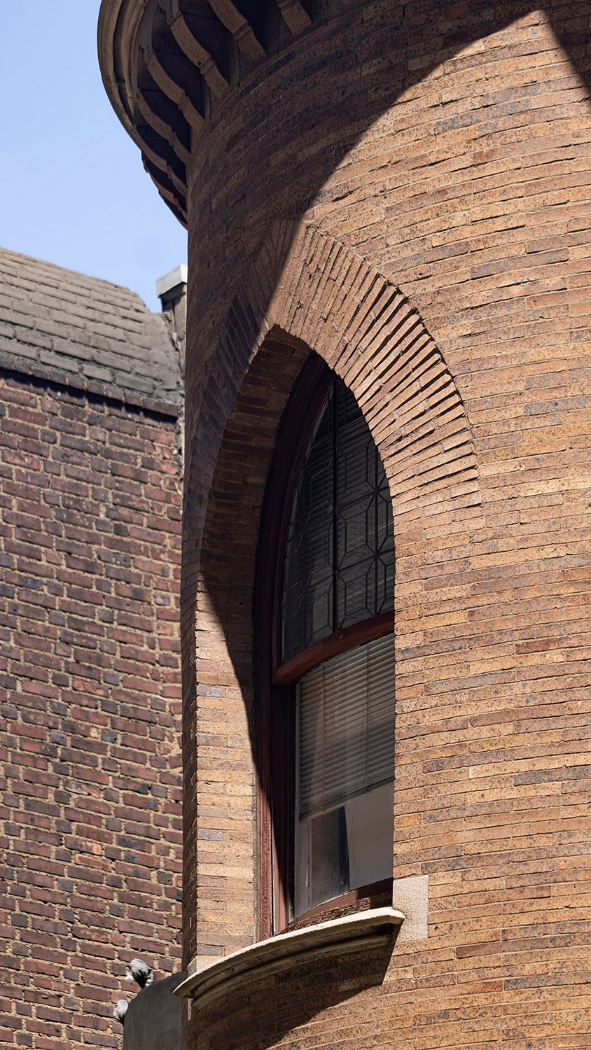 Second-floor window on the back circular tower of the Clarence B. Moore Residence, Philadelphia