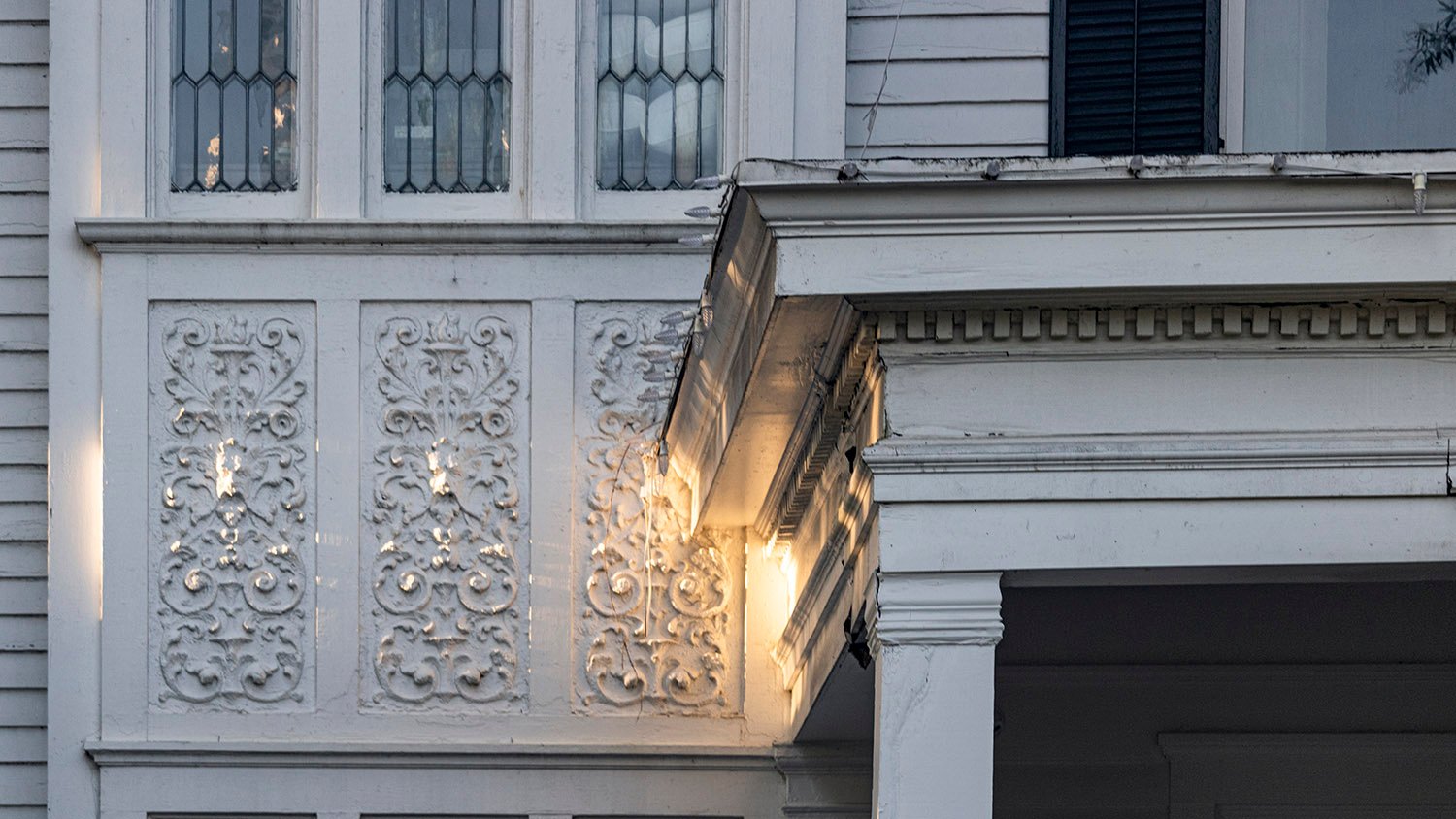 Window spandrel and dentilled cornice on the facade of the H.C. Dobbs Residence, Marietta, Georgia