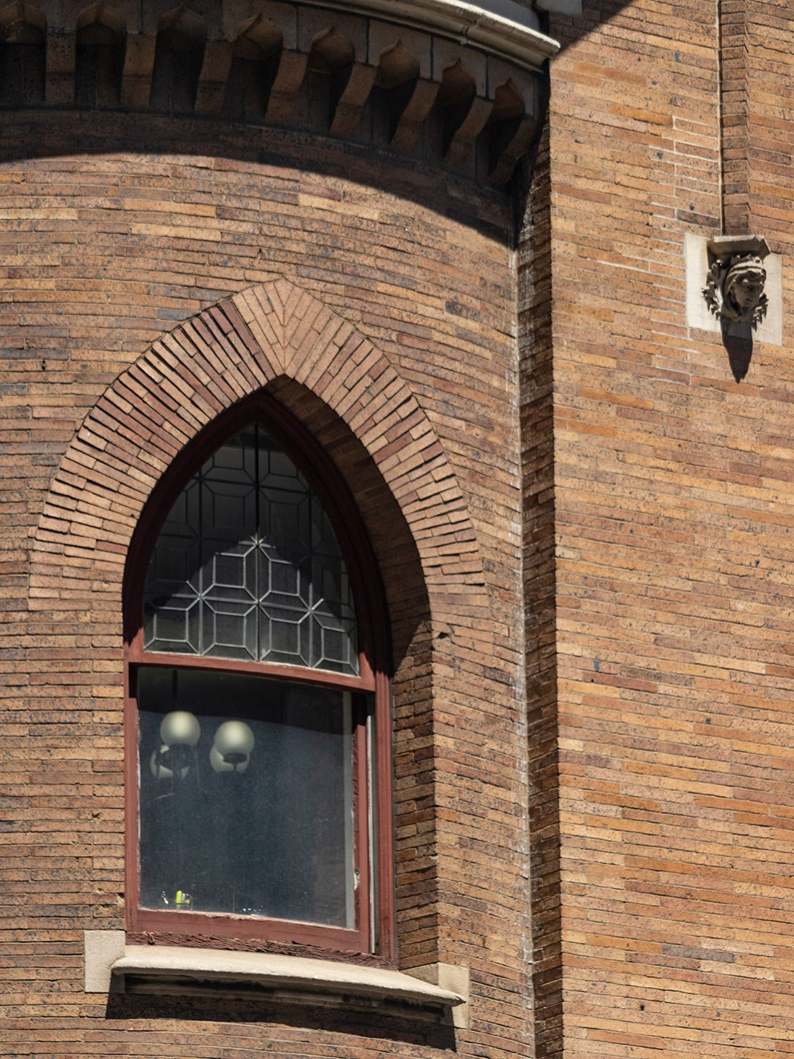 Second-floor window on the front circular tower of the Clarence B. Moore Residence, Philadelphia