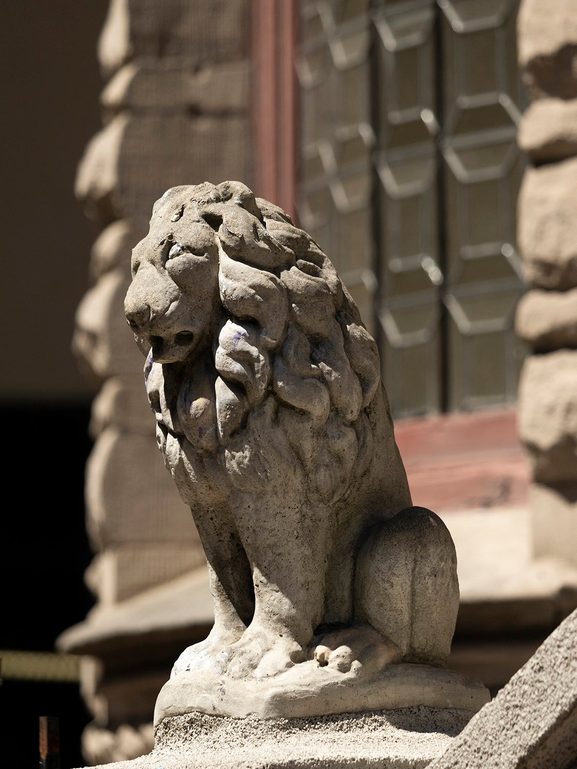 Lion at the front steps of the Clarence B. Moore Residence, Philadelphia