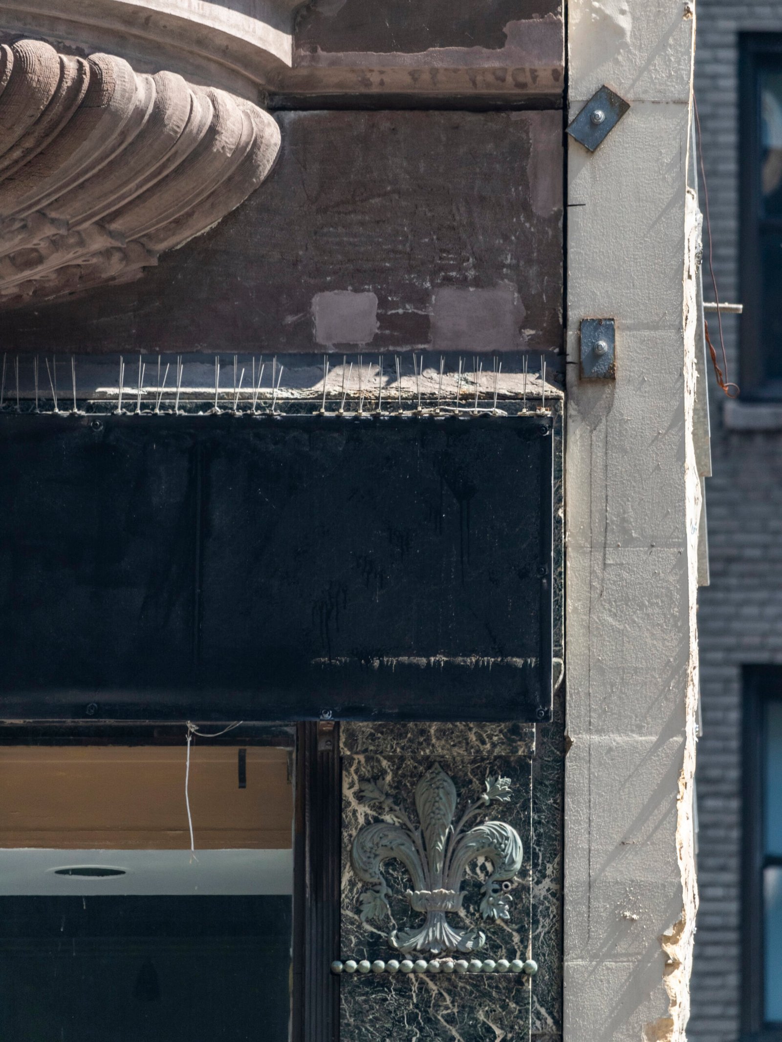 Fleur de lis ornamentation on the first-floor facade of the Samuel W. Bowne Residence, New York