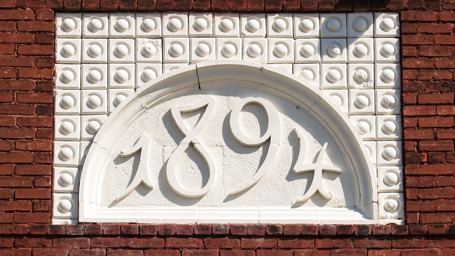 Terracotta date panel on the facade of Engine House No. 6, Atlanta
