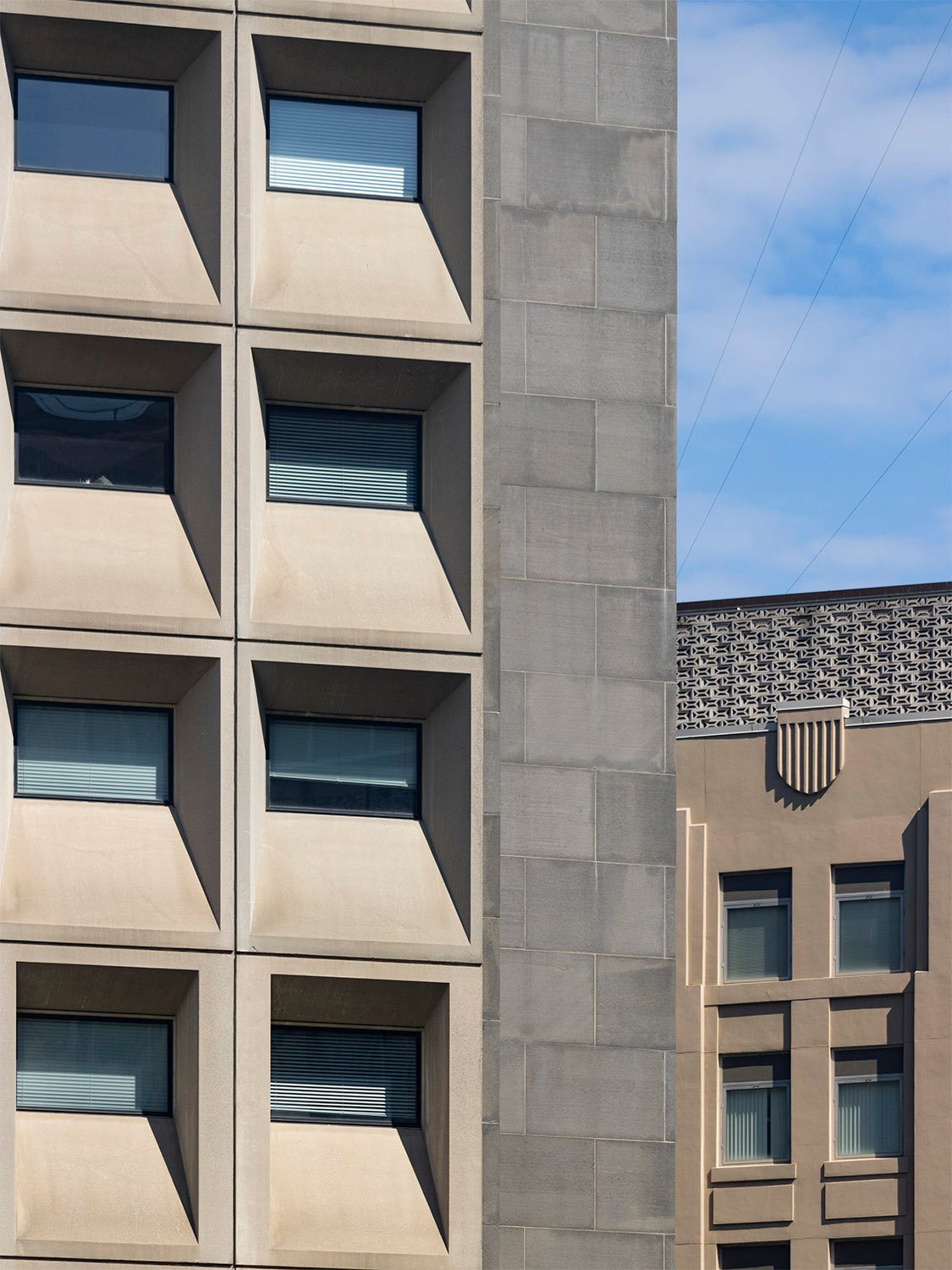 Windows on the northeast corner of the Department of Housing and Urban Development