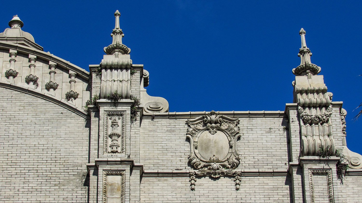 Terracotta ornamentation and finials on the facade of the Gulf, Mobile and Ohio Passenger Terminal, Mobile, Alabama
