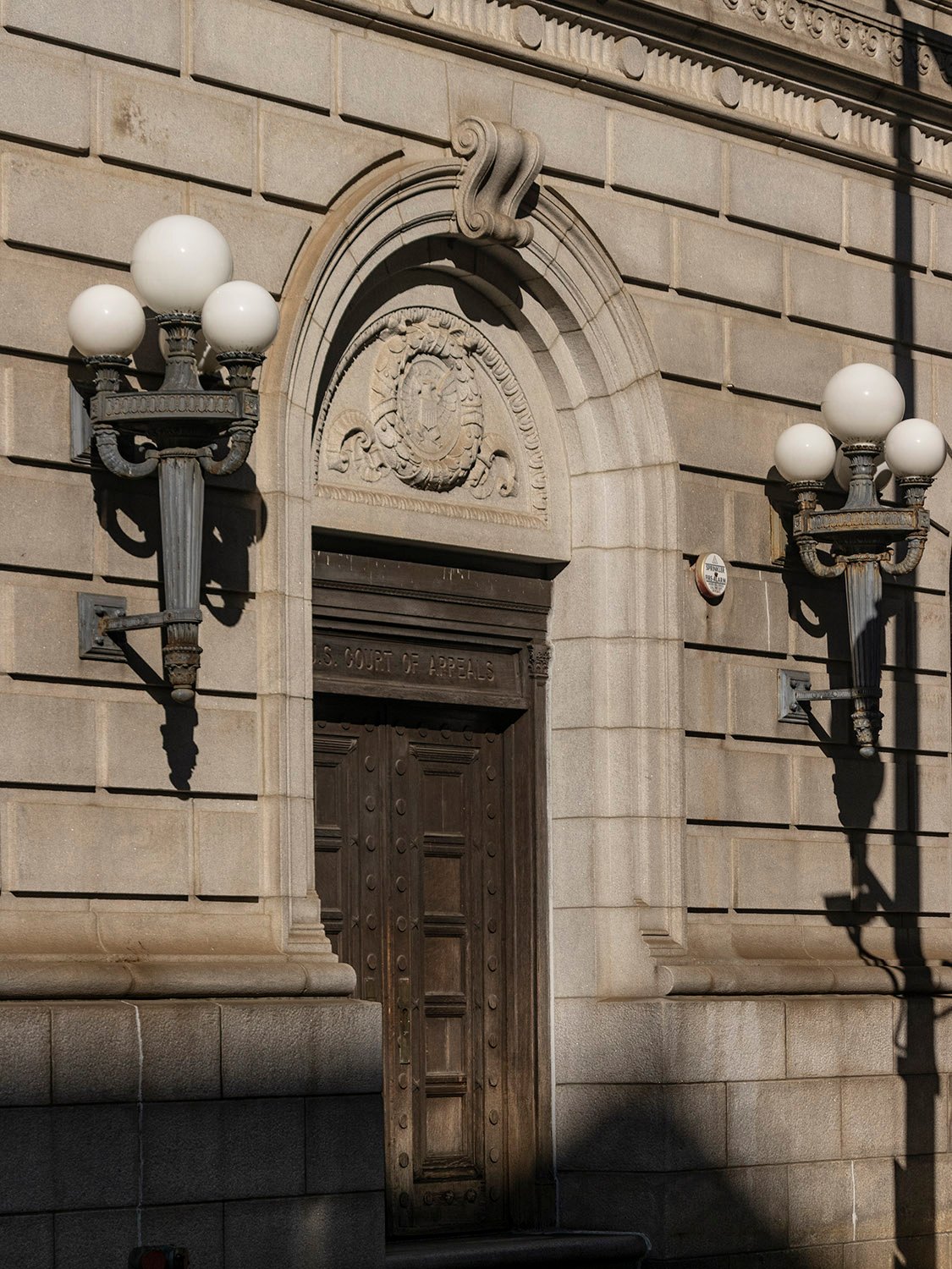 Front door and sconces on the facade of the United States Post Office and Courthouse, Atlanta