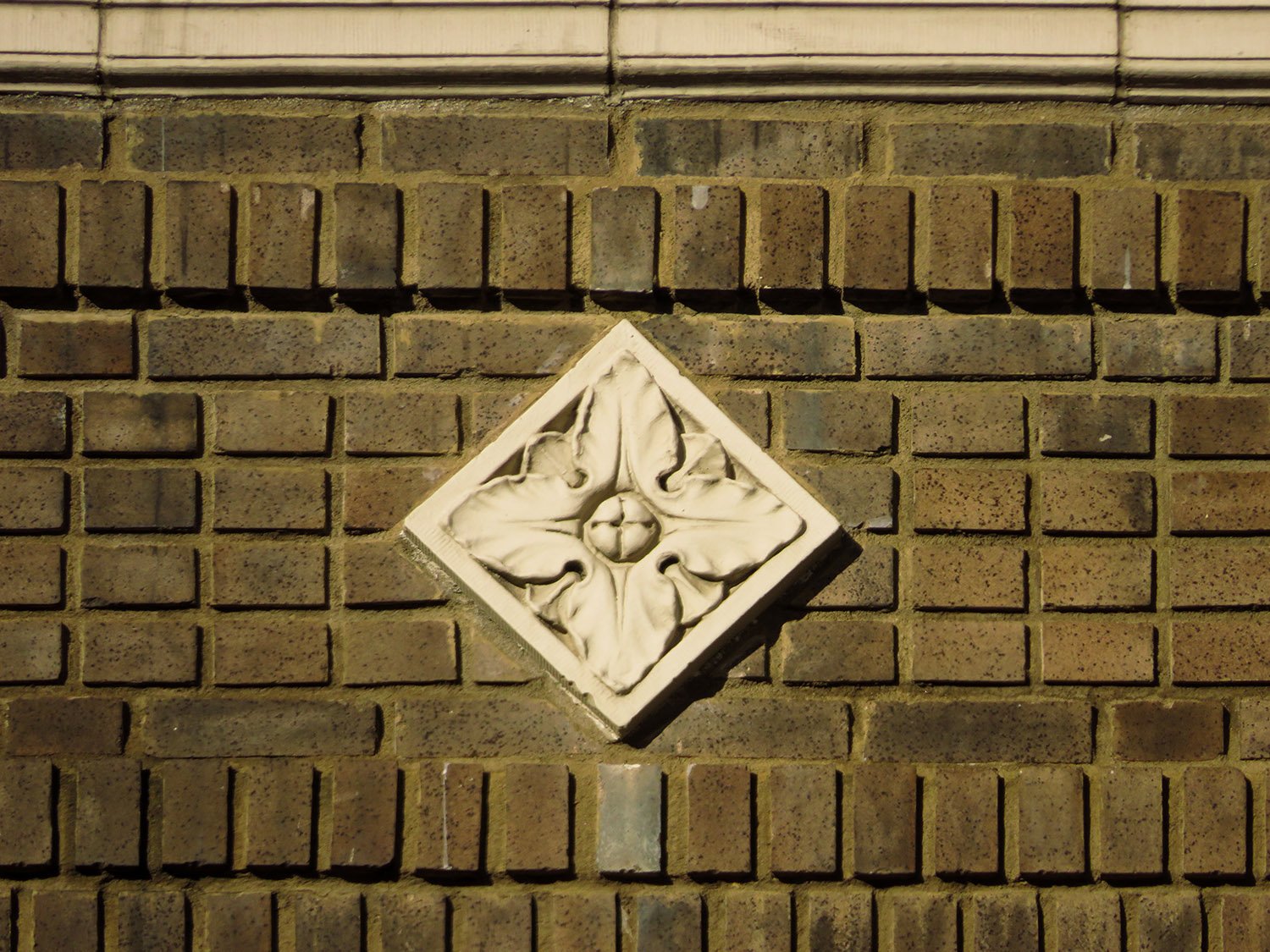 Terracotta diamond ornament on the facade of the Winecoff Hotel, Atlanta